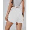 imageBlooming Jelly Womens High Waisted Running Shorts Athletic Workout Shorts Quick Dry Pants with Zipper PocketWhite